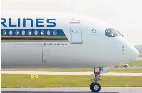  ?? Photo / Juha Remes, Getty Images ?? A Singapore Airlines A350-900.