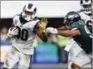  ?? KELVIN KUO - AP ?? Los Angeles Rams running back Todd Gurley II, left, was dangerous when he met the Eagles on Dec. 10. The Eagles may have to contend with Gurley and the Rams again if L.A. is the No. 4 seed in the NFC.