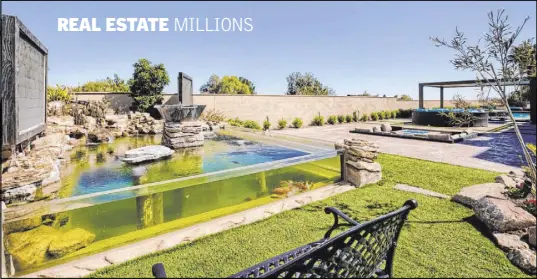  ?? Signature Real Estate Group ?? The 6,000-gallon koi pond in Brett Raymer’s backyard was featured on an episode of “Tanked.”