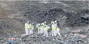  ?? Pictures: Getty/Flynet. ?? Top: the huge crater dug at the landfill in Milton to try to find Corrie McKeague, below. Above: police keep on digging.