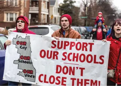  ?? SUN-TIMES FILE PHOTO ?? Demonstrat­ors protest in 2018 over the possible closing of several Chicago public schools.