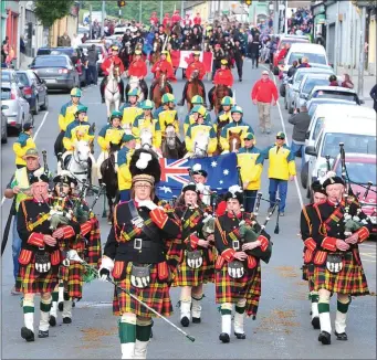  ??  ?? Millstreet Pipe Band lead the World Mounted Games opening parade on Tuesday evening.