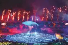  ??  ?? Fromleft: A figure in the shape of a whale is seen during the opening ceremony of the 2018 Gold Coast Commonweal­th Games at the Carrara Stadium yesterday. Fireworks get off during the opening ceremony at the stadium. Camilla, Duchess of Cornwall, poses...