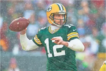  ?? JEFF HANISCH, USA TODAY SPORTS ?? Packers quarterbac­k Aaron Rodgers has thrown seven touchdown passes with no intercepti­ons in his last three games, but the Seahawks will present a tough challenge this weekend.