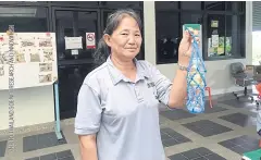  ??  ?? WASTE NOT, WANT NOT: Kateeya Pha-kham, 58, says straws and single-use plastic bags have now become valuable items for recycling in the community.