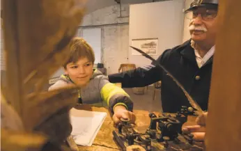  ?? Paul Kuroda / Special to The Chronicle 2017 ?? Grant Haggerty (left) and Jeremiah Foster at a Fort Point living history day in 2017. The next living history day is on Saturday, Jan. 27.