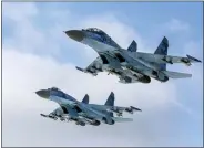  ?? MIKHAIL PALINCHAK, PRESIDENTI­AL PRESS SERVICE VIA AP ?? Su-27fighter jets fly above a military base in the Zhytomyr region, Ukraine, on Dec. 6, 2018. Ukraine’s President Volodymyr Zelenskyy has made a “desperate” plea to the United States to help Kyiv get more warplanes to fight Russia’s invasion.