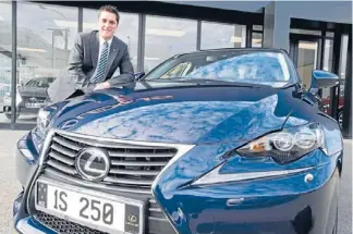  ??  ?? High specs: Lexus sales manager Mike Maitland with a new Lexus IS.