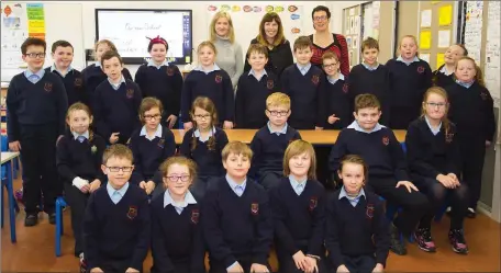  ??  ?? 4th class pupils in the new Edmond Rice school with teacher Joan Whelan.