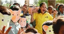  ??  ?? Krithi Karanth (centre) participat­es in a school workshop by Wild Shaale, with children posing as wild animals