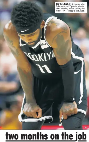  ??  ?? KY & LOW: Kyrie Irving, who finished with 27 points, reacts after missing a shot during the Nets’ 119-114 loss to the Jazz.