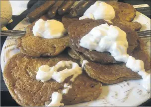  ??  ?? If you still have lots of pumpkin puree left over, try making them into pancakes, as pictured here with vegan whipped cream and vegan sausages.
