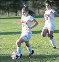 ?? File photo by Ernest A. Brown ?? Tolman midfielder Haliegh Correia (7) scored a first-half goal to help the Tigers earn a 2-2 draw with Woonsocket Wednesday.