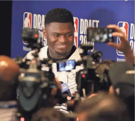  ?? BRAD PENNER/USA TODAY SPORTS ?? After playing in the bright lights in college at Duke, Zion Williamson speaks to the media Wednesday during a 2019 NBA draft prospects news conference at the Grand Hyatt.