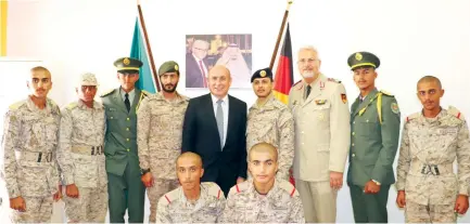  ??  ?? The first seven cadets from the Royal Saudi Land and Air Defense Forces pose for a group photo with German Ambassador Dieter W. Haller in Riyadh.