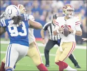  ?? MICHAEL CONROY — THE ASSOCIATED PRESS ?? Niners quarterbac­k Jimmy Garoppolo needs to be a little less easier to read by defenses when the field is short.