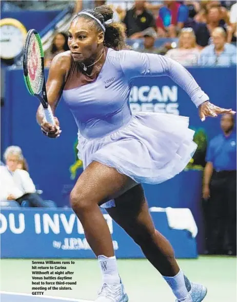  ??  ?? Serena Williams runs to hit return to Carina Witthoeft at night after Venus battles daytime heat to force third-round meeting of the sisters. GETTY