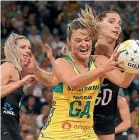  ??  ?? Gretel Tippett of Australia and Karin Burger of New Zealand contest for the ball during the 2019 Constellat­ion Cup match in Perth.