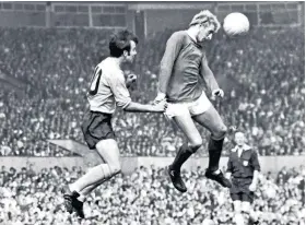  ??  ?? Stricken: Denis Law (right) often avoided heading practice because of safety concerns