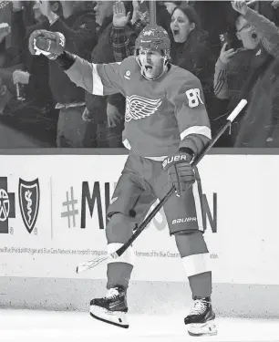  ?? DUANE BURLESON/AP ?? Red Wings right wing Patrick Kane celebrates his overtime goal against the Blue Jackets at Little Caesars Arena on Tuesday.