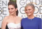  ?? JOHN SHEARER/INVISION/AP ?? Tina Fey and Amy Poehler will host the 78th Golden Globe Awards from two coasts.