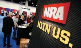  ??  ?? Attendees sign up at the National Rifle Associatio­n (NRA) booth at the Conservati­ve Political Action Conference (CPAC) annual meeting in Maryland in February. Photograph: Joshua Roberts/Reuters