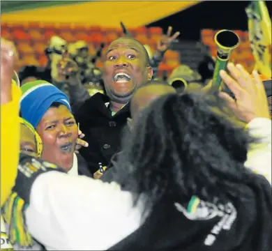  ?? Picture: EUGENE COETZEE ?? TRIUMPHANT PROCESSION: ANC members carry provincial secretary Oscar Mabuyane to the podium