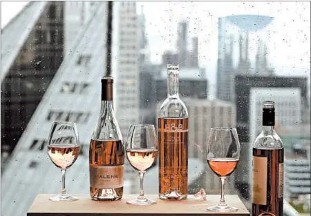  ?? ABEL URIBE/CHICAGO TRIBUNE; SHANNON KINSELLA/STYLING ?? There’s no better bottle of wine for a picnic than a pink one — such as these rosés from the Malene and Hecht &amp; Bannier wineries.