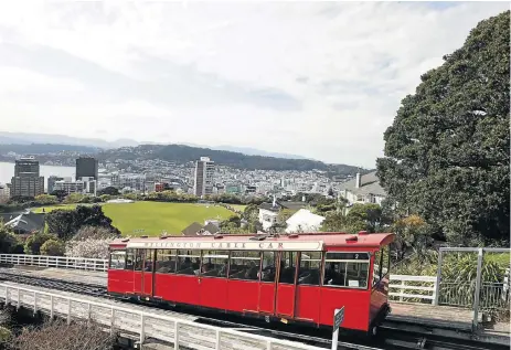  ?? /Reuters ?? High points: While the cable car, which seems to ascend mere metres, is an anticlimax, the rest of Wellington is a wonderful mix of upmarket dining and fine wines, and gritty dive bars and hipster eateries. However, the golden thread running through...