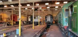  ??  ?? The former Barry shed still retains much of its steam atmosphere inside, and today is the main storage area for the railway's rolling, including refurbishe­d ex-Gatwick Express Mk2F coaches, a BR ZRA van and a GWR 'Toad' brakevan. GARY BOYD-HOPE