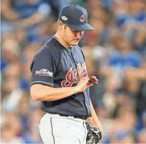  ?? JOHN E. SOKOLOWSKI/USA TODAY SPORTS ?? The Indians’ Trevor Bauer, who was a curiosity in 2016 with a cut finger, is now one of the game’s top pitchers.