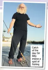  ??  ?? Catch of the day: Sir Billy enjoys a spot of fishing