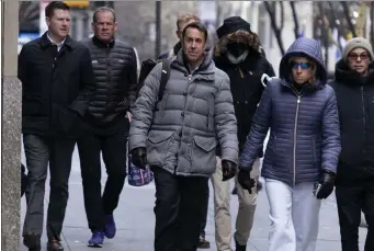  ?? AP ?? Major League Baseball deputy commission­er Dan Halem, center, arrives for a meeting in New York for the first inperson baseball negotiatin­g session since the MLB lockout began.