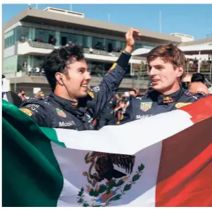  ?? AFP ?? Wave of pride: Red Bull’s Mexican driver Sergio Perez (left) celebrates finishing on the podium in his home Grand Prix with teammate and race winner Max Verstappen.