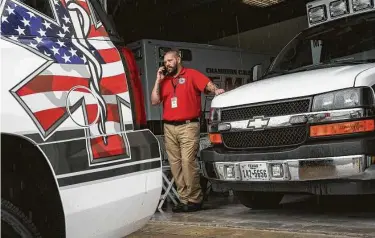  ?? Jon Shapley / Staff photograph­er ?? Ron Nichols, emergency services director for Chambers County, talks on the phone in Anahuac.