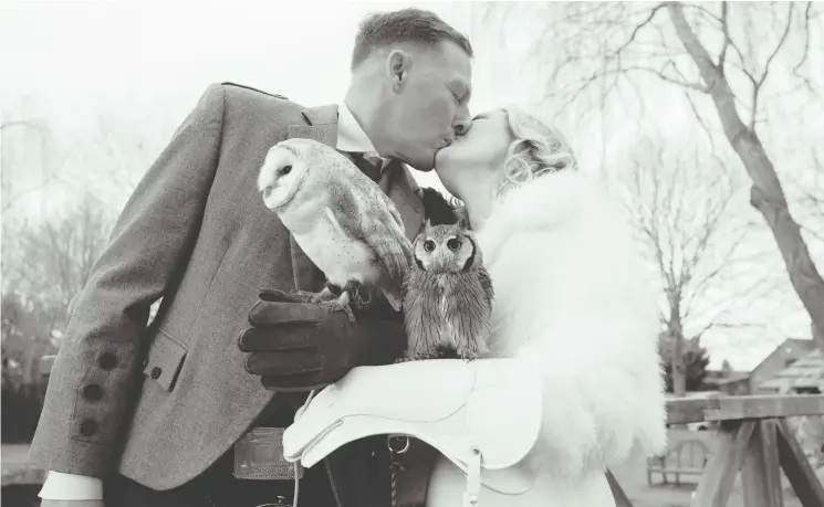  ?? KRISTY GARLAND ?? Derek and Dawn Derby had Juno the barn owl deliver their rings and another, smaller owl, Diego, at their wedding ceremony in January in Chester, England.