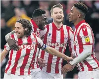  ??  ?? JUBILANT JOE Allen (left) celebrates sealing Stoke’s victory