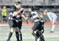  ?? ?? Lincoln-Way Central’s Zach Davis, left, celebrates with Espinosa after Espinosa’s goal against Lincoln-Way West