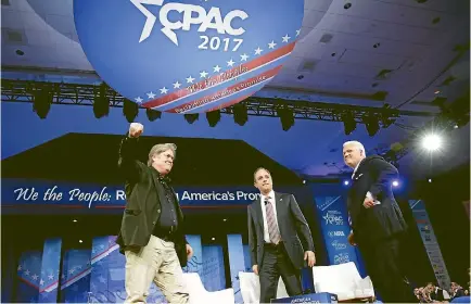  ?? PHOTO: REUTERS ?? White House chief strategist Stephen Bannon, left, White House chief of staff Reince Priebus and American Conservati­ve Union chairman Matt Schlapp wave after speaking at the Conservati­ve Political Action Conference (CPAC) in National Harbour, Maryland.