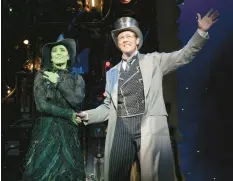  ?? JOAN MARCUS PHOTO ?? Lissa deGuzman as Elphaba and John Bolton as The Wizard in the national tour of“Wicked.”