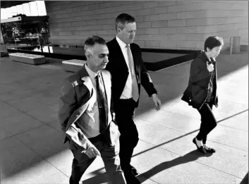  ?? AP Photo/Brian Melley ?? In this 2019 file photo, Imaad Zuberi (left) leaves a federal courthouse with his attorney Thomas O’Brien, second from left, in Los Angeles.