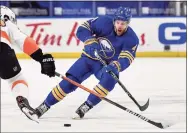  ?? Adrian Kraus / Associated Press ?? The banged-up Boston Bruins are getting a boost for their late-season playoff push by acquiring forward Taylor Hall in a trade with the Buffalo Sabres on Monday.