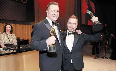  ?? EMMA MCINTYRE GETTY FILE PHOTO ?? Brendan Fraser, left, winner for best actor in a leading role, and Adrien Morot, winner of best makeup and hairstylin­g, both for "The Whale," attend the Governors Ball after the 95th Annual Academy Awards at Dolby Theatre Sunday.