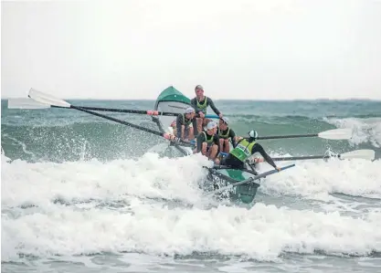  ?? PHOTO: SHONA KEBBLE ?? The Titahi Bay man’s surf boat team faced testing conditions at Whangamata this month.