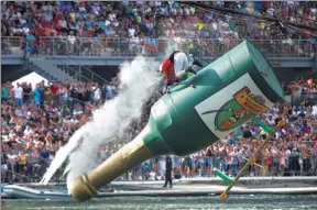  ?? MAXIM SHEMETOV / REUTERS ?? A participan­t from the Squadron of Flying Hussars operates a self-made flying machine during the Red Bull Flugtag Russia 2017 competitio­n in Moscow on Sunday.