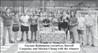  ?? ?? Guyana Badminton cxecutives, Darrell Carpenay and Marlon Chung with the winners