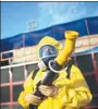  ?? LEO CORREA / ASSOCIATED PRESS ?? A health worker sprays insecticid­e to combat the Aedes aegypti mosquitoes that transmit the Zika virus, in Rio de Janeiro last year.