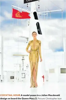 ?? Picture: Christophe­r Ison ?? COCKTAIL HOUR A model poses in a Julien Macdonald design on board the Queen Mary 2.