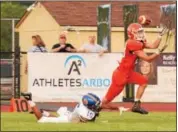  ?? AUSTIN HERTZOG - DIGITAL FIRST MEDIA ?? Perkiomen Valley’s Remy Sell hauls in a long reception from quarterbac­k Cole Peterlin to set up the Vikings’ first TD Friday against Downingtow­n West.