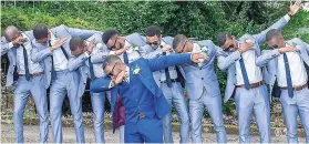  ??  ?? Javed Jackson and his groomsmen doing the ‘Dab’ at his wedding at Bellefield Great House.